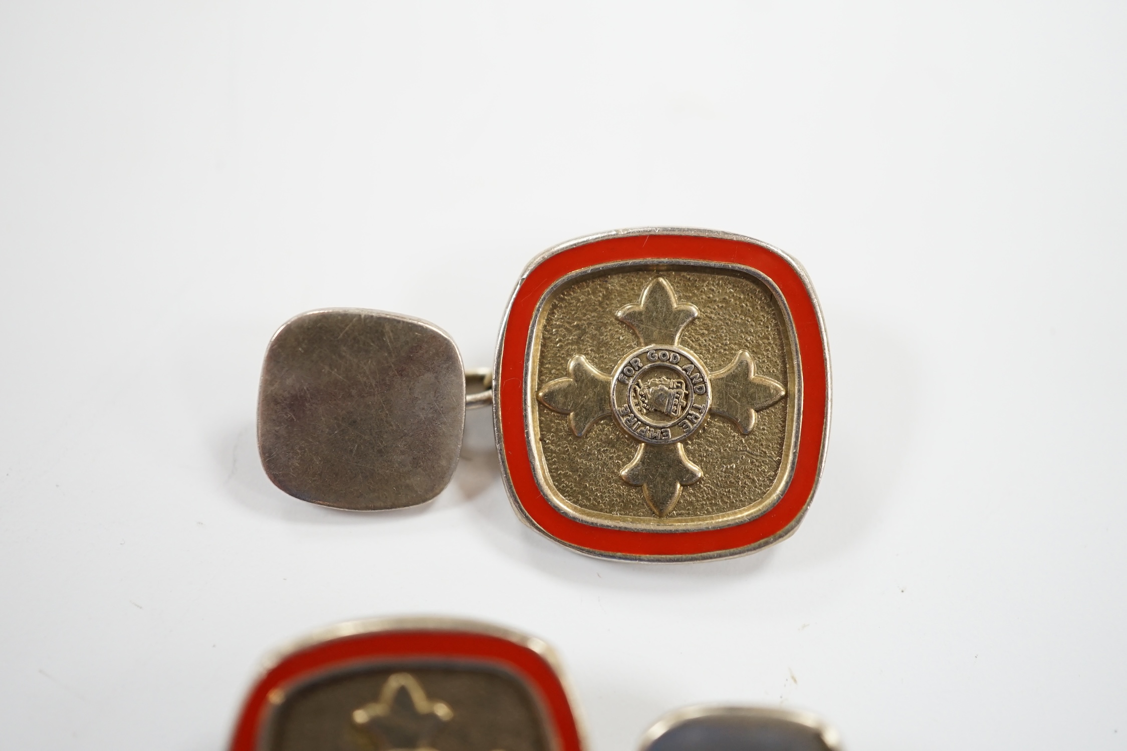 A modern pair of silver and red enamel cufflinks, embossed with the Order of The British Empire, by Toye, Kenning & Spencer, 19mm.